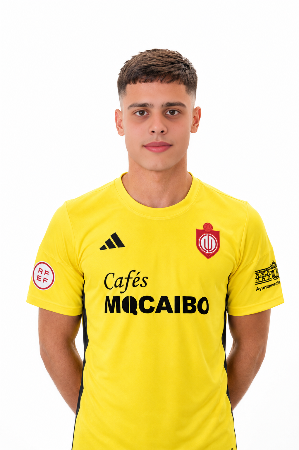 Goalkeeper Bilal Jabri Jabri photographed in a yellow club kit